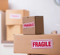 Man,moving,house,and,relocating,with,fragile,items